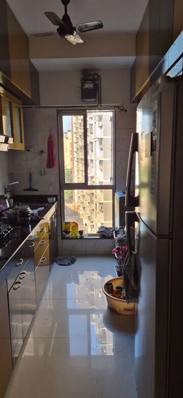 Kitchen in 2 BHK Apartment at Yash Laxman Niwas, Malad West – for Rent