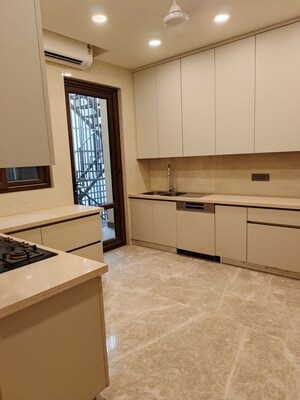 Kitchen in 4 BHK Builder Floor at Defence Colony – for Rent