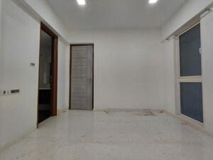 Room in 2 BHK Apartment at Ekta Tripolis, Goregaon West – for Rent