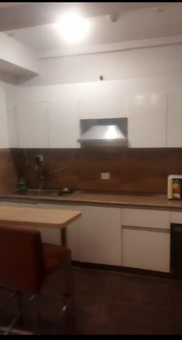 Kitchen in Studio Apartment at Nimbus The Golden Palm, Sector 168 – for Rent