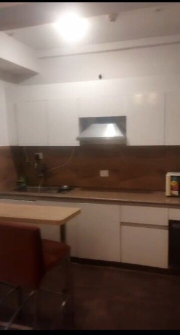 Kitchen in Studio Apartment at Nimbus The Golden Palm, Sector 168 – for Rent