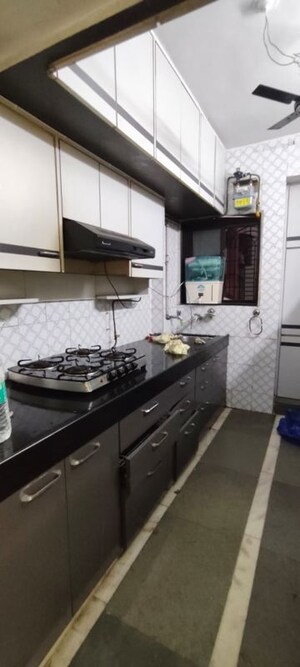 Kitchen in 2 BHK Apartment at Rutu Park Majiwada, Thane West – for Rent