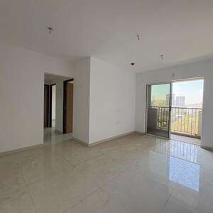 Living Room in 2.5 BHK Apartment at Lodha Codename Premier, Mangaon – for Rent