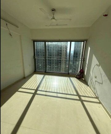 Bedroom in 2 BHK Apartment at Kalpataru Sunrise Grande, Kolshet Road – for Rent