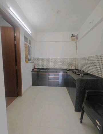 Kitchen in 2 BHK Apartment at Mantra Alkasa, Mohammadwadi – for Rent