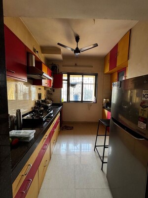 Kitchen in 2 BHK Apartment at Hyde Park Galaxy, Manpada – for Sale