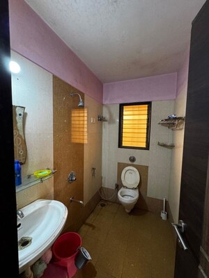 Bathroom in 2 BHK Apartment at Hyde Park Galaxy, Manpada – for Sale