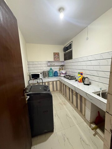 Kitchen in 2 BHK Builder Floor at Kalkaji – for Rent
