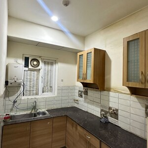 Kitchen in 2 BHK Apartment at Gaur City 7th Avenue, Sector 4 Greater Noida – for Rent