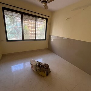 Room in 2 BHK Apartment at Shilpin CHS, Mahavir Nagar – for Rent