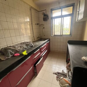 Kitchen in 2 BHK Apartment at Shilpin CHS, Mahavir Nagar – for Rent