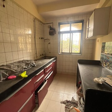 Kitchen in 2 BHK Apartment at Shilpin CHS, Mahavir Nagar – for Rent