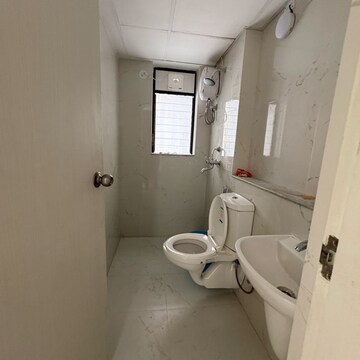 Bathroom in 1 BHK Apartment at Runwal Gardens Phase 3, Kalyan Shilphata Road – for Rent