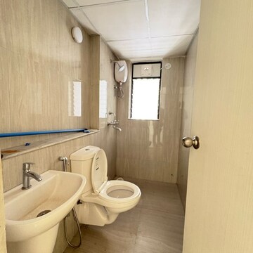 Bathroom in 1 BHK Apartment at Runwal Gardens Phase 3, Kalyan Shilphata Road – for Rent
