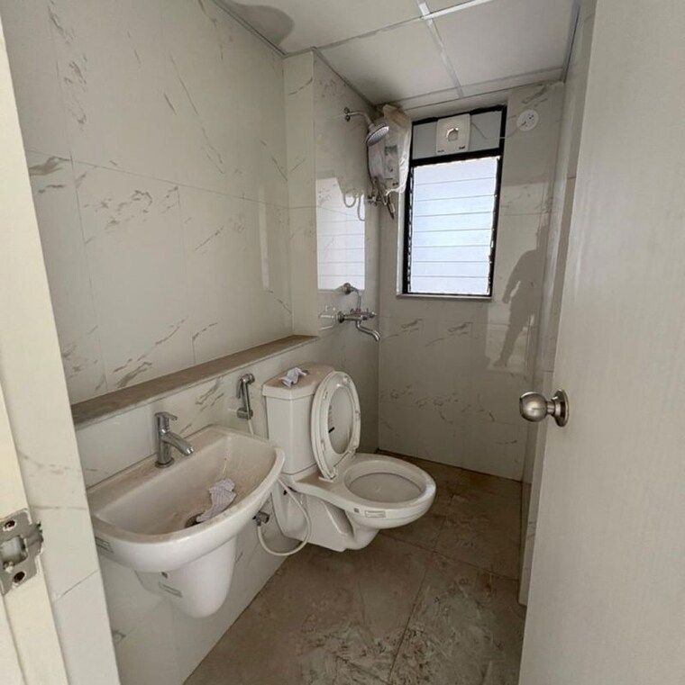 Bathroom, runwal-gardens-phase-2 2 Bedroom 674 Sq.Ft. Apartment In Kalyan Shilphata Road Thane 9726865