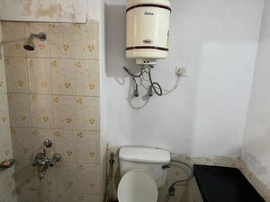 Bathroom in 2 BHK Apartment at Ansal Paradise Crystal, Sushant Golf City – for Rent