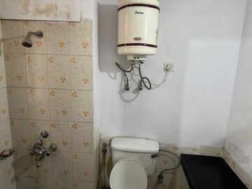 Bathroom in 2 BHK Apartment at Ansal Paradise Crystal, Sushant Golf City – for Rent