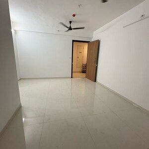 Living Room in 2 BHK Apartment at Lodha Codename Premier, Mangaon – for Rent