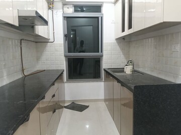 Kitchen in 2 BHK Apartment at Lodha Amara Tower 44, Kolshet Road – for Rent