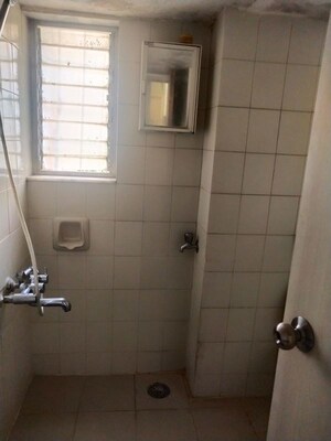 Bathroom in 3 BHK Apartment at Deepti Shakti Mukti CHS, Andheri West – for Rent