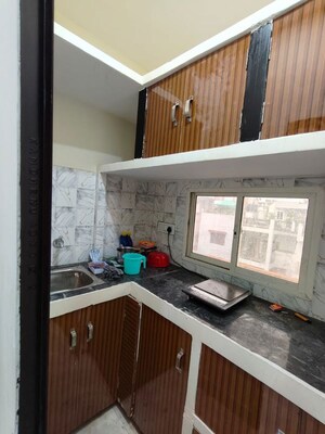 Kitchen in 2 BHK Apartment at Apex Anuradha Apartments, Paschim Vihar – for Rent