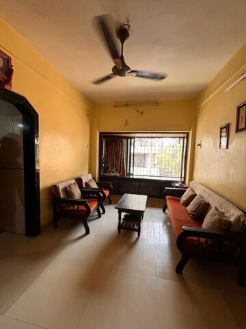 Living Room in 1.5 BHK Apartment at Someshwar CHS, Vashi Sector 14 – for Rent
