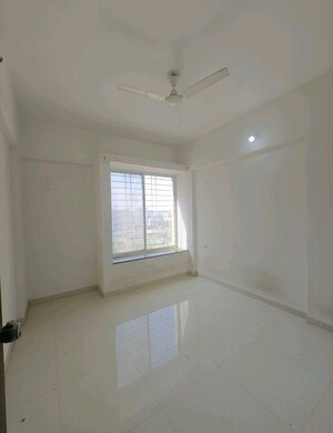 Bedroom in 2 BHK Apartment at Dynamic Grandeur, Undri – for Rent