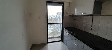 Kitchen in 1.5 BHK Apartment at Man Opus, Mira Road – for Sale