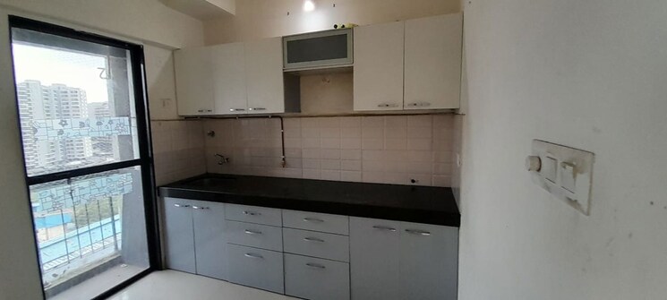 Kitchen, man-opus 1.5 Bedroom 750 Sq.Ft. Apartment In Mira Road Thane 9727150