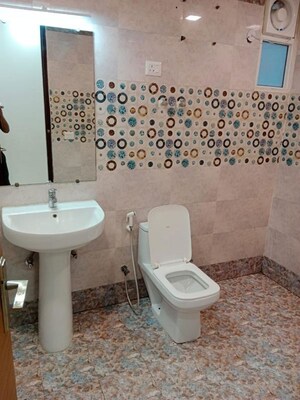 Bathroom in 4 BHK Apartment at Saya Gold Avenue, Vaibhav Khand – for Rent