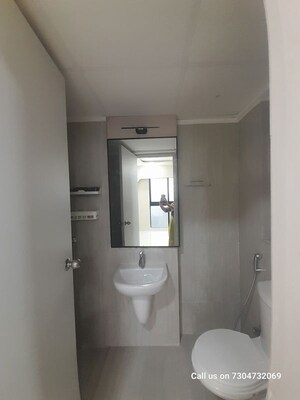 Bathroom in 1 BHK Apartment at Runwal Gardens, Dombivli East – for Rent