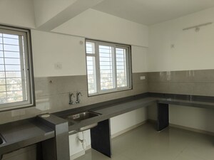 Kitchen in 3 BHK Apartment at Millennium Emirus, Wakad – for Sale