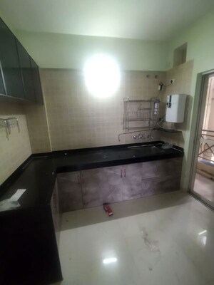 Kitchen in 2 BHK Apartment at Nyati Ethos, Undri – for Rent