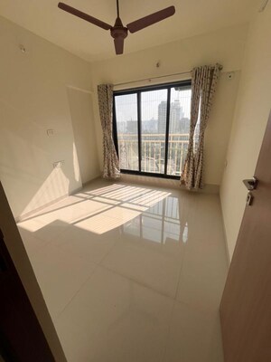 Room in 2 BHK Apartment at Oxford Navrang Crystal, Goregaon West – for Rent