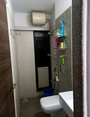 Bathroom in 1 BHK Apartment at Kanakia Rainforest, Andheri East – for Rent