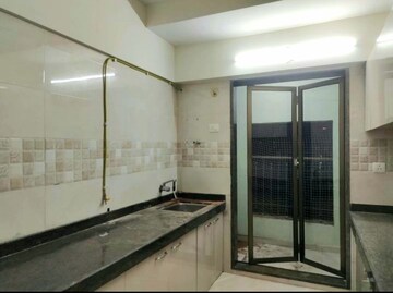 Room in 2 BHK Apartment at Anon Mulund Giriraj CHS, Mulund West – for Rent