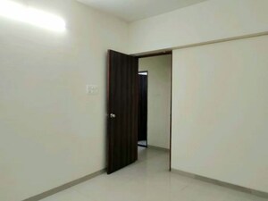 Room in 2 BHK Apartment at Anon Mulund Giriraj CHS, Mulund West – for Rent