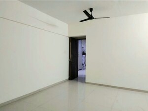 Room in 2 BHK Apartment at Anon Mulund Giriraj CHS, Mulund West – for Rent