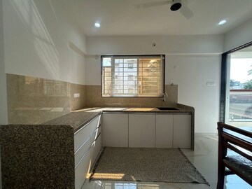 Kitchen in 2 BHK Apartment at Karve Nagar – for Sale