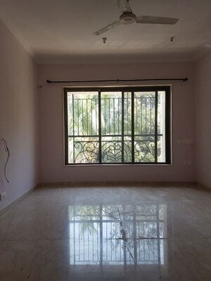 Bedroom in 3 BHK Apartment at Laxmi Raajvilas, Goregaon West – for Rent