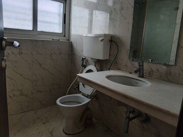 Bathroom in 3 BHK Apartment at Lokhandwala Whispering Palms XXclusives, Kandivali East – for Rent