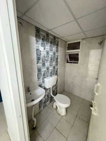 Bathroom in 2 BHK Apartment at Signature The Millennia 3, Sector 37d – for Rent