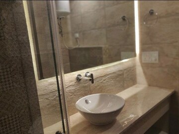 Bathroom in 4 BHK Builder Floor at Green Park Extension – for Rent