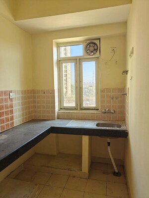 Kitchen in 2 BHK Apartment at Shree Vardhman Mantra, Sector 67 – for Sale