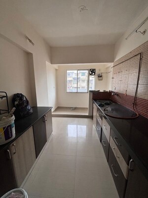 Kitchen in 3 BHK Apartment at Namrata Magic Pimple Saudagar, Pimple Saudagar – for Rent