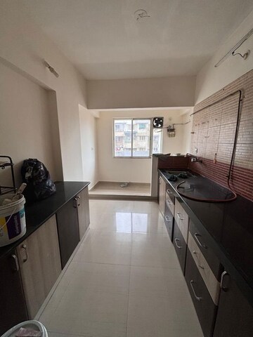 Kitchen in 3 BHK Apartment at Namrata Magic Pimple Saudagar, Pimple Saudagar – for Rent