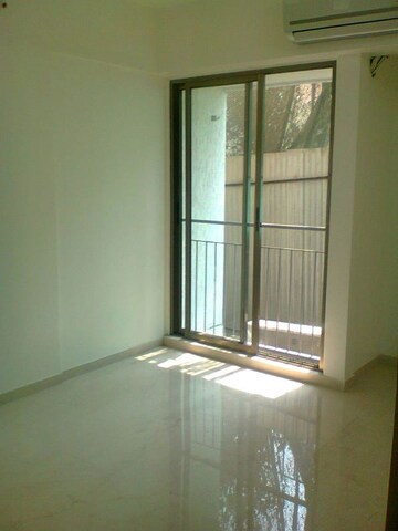 Room in 2 BHK Apartment at Andheri CHS, Andheri West – for Rent
