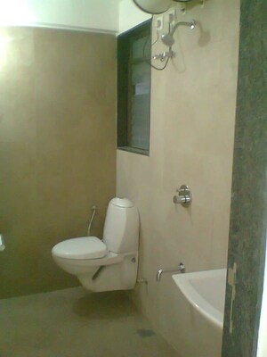 Bathroom in 2 BHK Apartment at Andheri CHS, Andheri West – for Rent