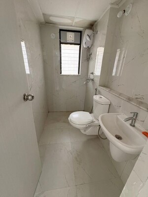 Bathroom in 1 BHK Apartment at Runwal Gardens Phase 3, Kalyan Shilphata Road – for Rent