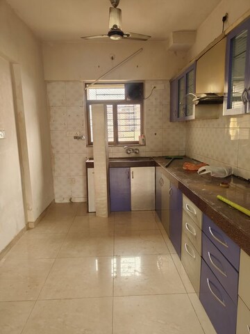 Kitchen in 3 BHK Apartment at Jasmine Tower, Vasant Vihar – for Rent